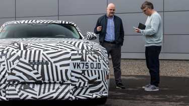 Jaguar GT 2025 - front static with Auto Express Editor Paul Barker and JLR engineering director Matt Becker 